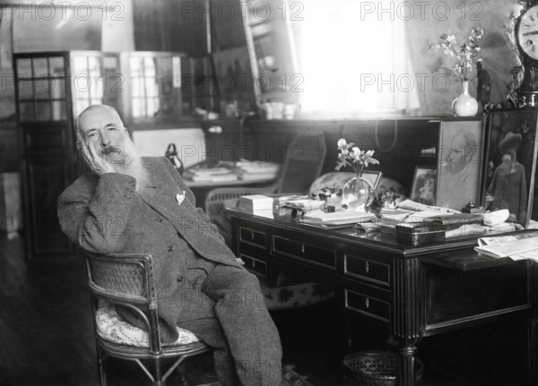 Claude Monet in his office at Giverny, French painter and founder of Impressionism, digitally optimized based on a historical photograph