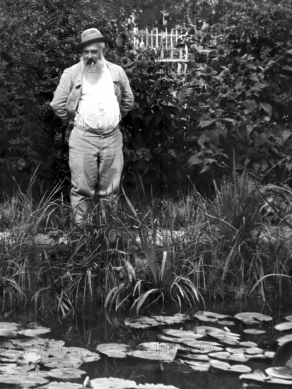 Portrait of Claude Monet, garden at Giverny, 1840 – 1926, French painter and founder of Impressionism, digitally optimized based on a historical photograph