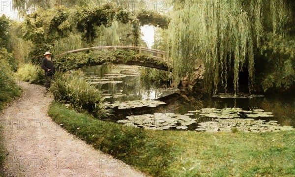 Portrait of Claude Monet, garden at Giverny, 1840 – 1926, French painter and founder of Impressionism, digitally optimized based on a historical photograph, subsequently colored