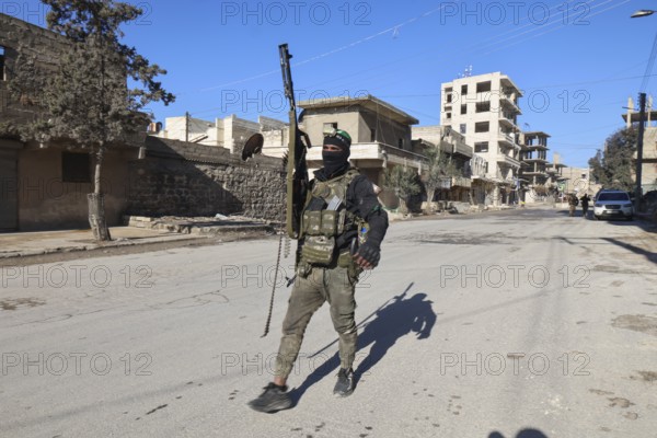 In Aleppo, Syria on January 10, 2026, Syrian Army soldiers deploy throughout the Sheikh Maqsoud and Ashrafieh neighborhoods following days of fierce clashes with SDF Kurdish forces, which ultimately resulted in the withdrawal of the Kurdish forces towards eastern Syria, Aleppo, Sheikh Maqsood, Syria