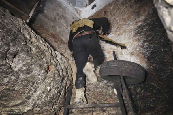 In Aleppo, Syria on January 10, 2026, members of the Syrian Army inspect underground tunnels previously used by SDF fighters in the Sheikh Maqsoud neighborhood following the halt of military operations and the evacuation of Kurdish groups towards eastern Syria, Aleppo, Sheikh Maqsood, Syria