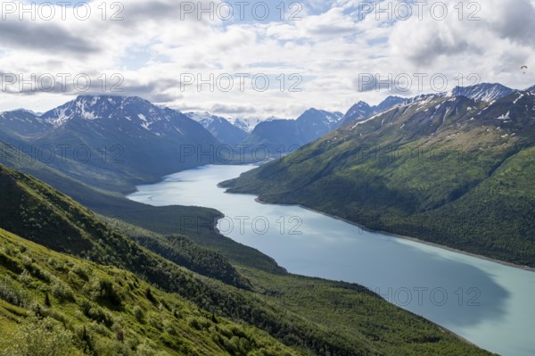 View of blue lake and mountains on Twin Peaks Trail, Eklutna Lake, Chugach Mountains, Chugach State Park, Alaska, USA
