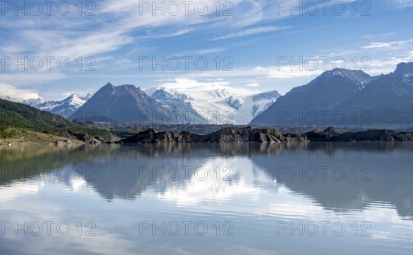 Mountain landscape reflected in glacial lake, Mount Blackburn and Kennicott Glacier, McCarthy Road, Wrangell St. Elias National Park, Alaska, USA