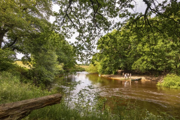 Canoeists do water sports on the Hunte near Astrup, Barneführer Holz, Wardenburg, Lower Saxony, Germany