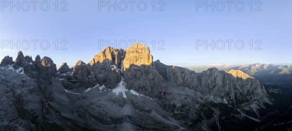 Aerial view, alpine panorama, Cima Tosa and rocky peaks at sunrise with alpine glow, picturesque mountain landscape, Brenta Dolomites, Trentino, Italy
