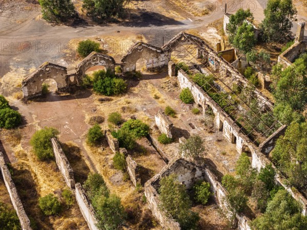 Ruins of former workshop halls, Mina de Sao Domingos, historic copper open-pit mine, aerial view, Portugal