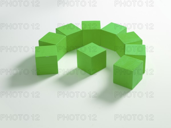 9 green wooden cubes against a white background