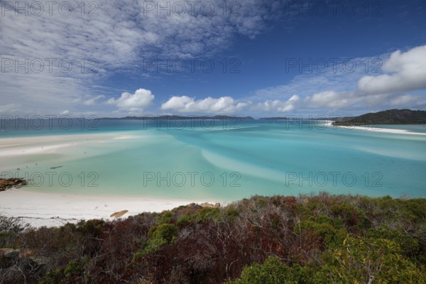 Sunny daytime view from Hill Inlet lookout over Whitehaven Beach, Whitsunday Island, Queensland, Australia