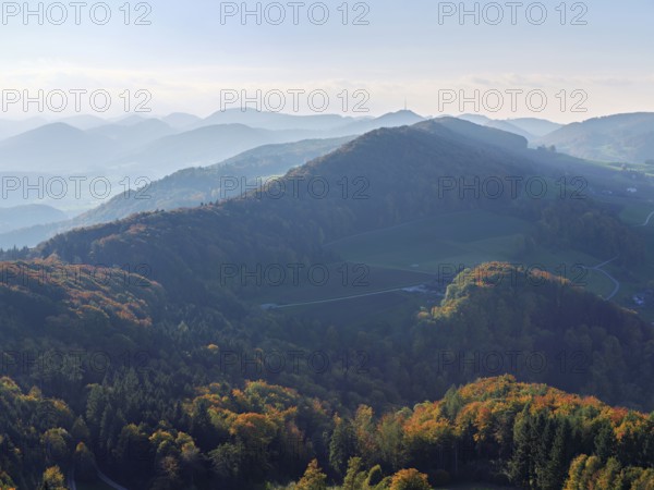 View of an autumnal forest from the Gisliflue, behind the Jurassic foothills with the Wasserfluh, Talheim, Canton, Aargau, Switzerland
