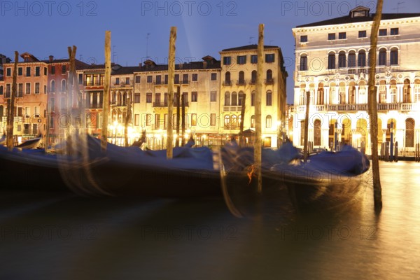 Gondolas and palaces on the Grand Canal, Venice, Veneto, Italy