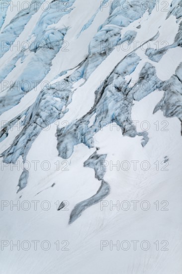 Blue rugged glacier ice with crevasses and snow, detail, Exit Glacier, Kenai Peninsula, Alaska, USA