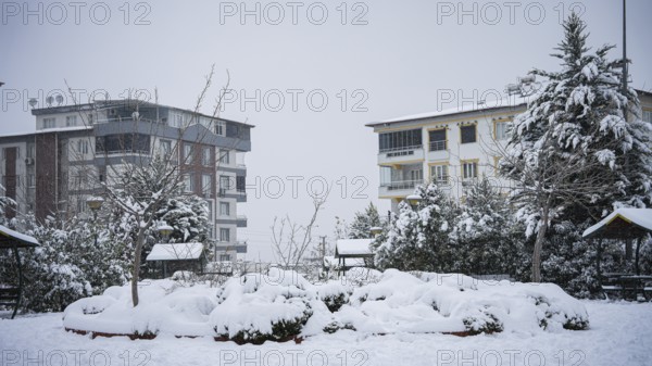 In Gaziantep, Turkey, on December 31, 2025, children and families enjoy winter activities as they play on snow-covered areas and slide on icy hills, creating a lively atmosphere across the city during the final day of the year, Gaziantep, Gaziantep, Turkey
