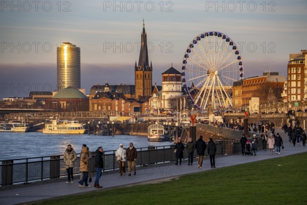 Rhine promenade in Düsseldorf, Ferris wheel, old castle tower, St. Lambert Basilica, old town, ERGO Insurance high-rise building, North Rhine-Westphalia, Germany