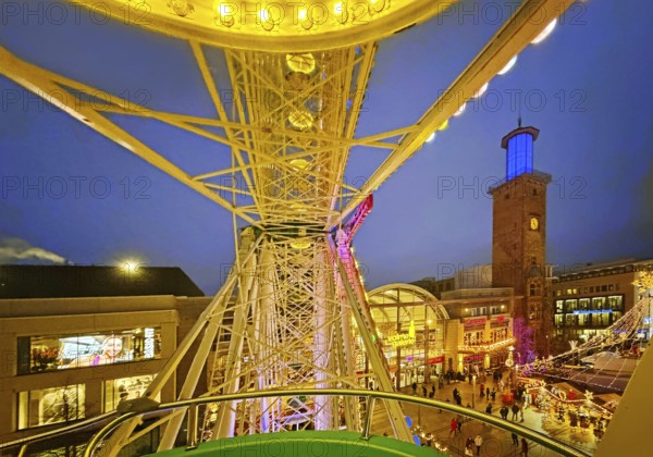 View of the town hall tower with the Christmas market from a Ferris wheel gondola, Hagen, Ruhr area, North Rhine-Westphalia, Germany