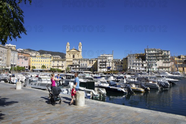 Old port with marina and church of Saint Jean-Baptiste à Bastia or church of St. John the Baptist, Port de Plaisance or Vieux Port, old town, Bastia, Haute-Corse department, Corsica, France