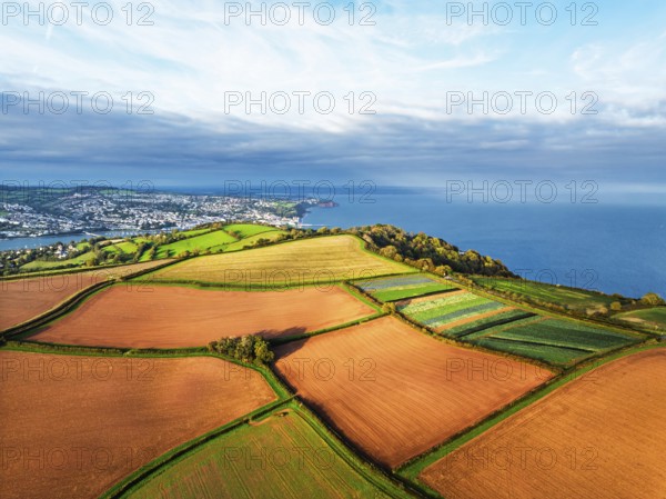 Colours of autumn Fields and Farms over Sheldon from a drone, Torbay, Devon, England, United Kingdom