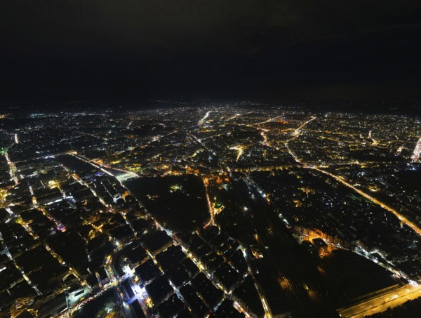 A Drone night view of Aleppo, Syria on December 19, 2025, showing illuminated streets, dense residential areas, and major traffic routes under the night sky, Aleppo, Aleppo, Syria