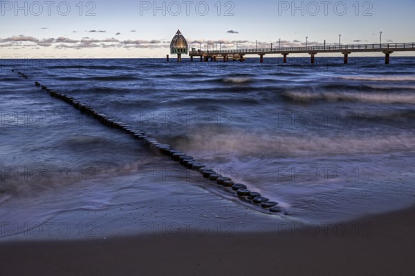 Groes and pier with diving gondola, long exposure, evening light, Zingst, Fischland-Darß-Zingst, Western Pomerania Lagoon Area National Park, Mecklenburg-Western Pomerania, Germany