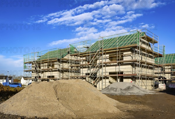 Castrop-Rauxel, North Rhine-Westphalia, Germany - residential construction in the Ruhr area. New construction district with semi-detached and terraced houses in the energy-saving KfW efficiency house standard 55