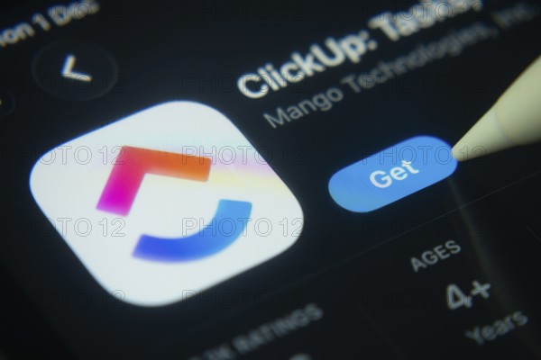 Dhaka, Bangladesh- 01 Dec 2025: A close-up of the ClickUp app icon in the App Store on an iPad screen