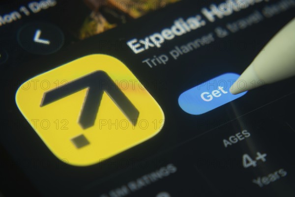 Dhaka, Bangladesh- 01 Dec 2025: A close-up of the Expedia app icon in the App Store on an iPad screen