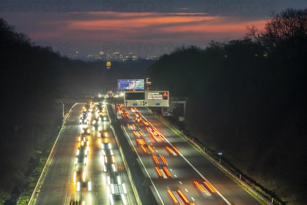 Evening traffic on the A52 motorway, between Düsseldorf and Essen, in front of the Breitscheid motorway junction, partly slow rush hour traffic, looking south, North Rhine-Westphalia, Germany