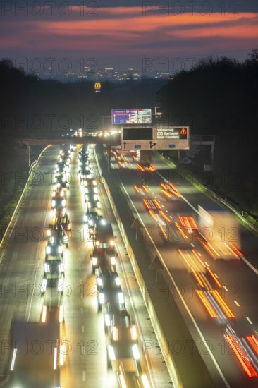 Evening traffic on the A52 motorway, between Düsseldorf and Essen, in front of the Breitscheid motorway junction, partly slow rush hour traffic, looking south, North Rhine-Westphalia, Germany