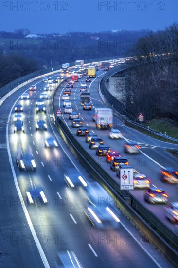 Evening traffic on the A52 motorway, between Düsseldorf and Essen, at the Ruhr Valley Bridge, across the Ruhr near Mülheim-Mintard, partly slow, rush hour traffic, looking north, North Rhine-Westphalia, Germany