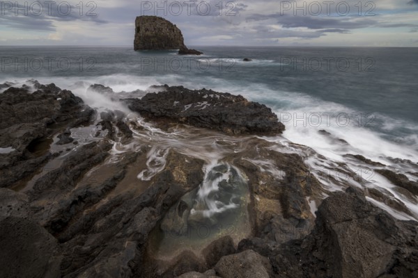 Rocky coast, volcanic rock formations, coast near Porto da Cruz, Madeira, Portugal