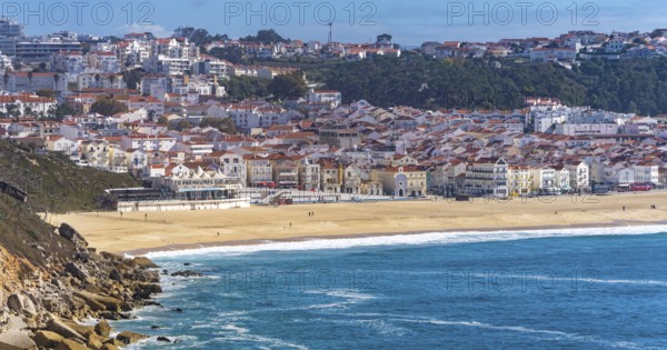 View from Leuct Tower towards orange tiled roofs in the town of Nazare, Estremadura, Portugal