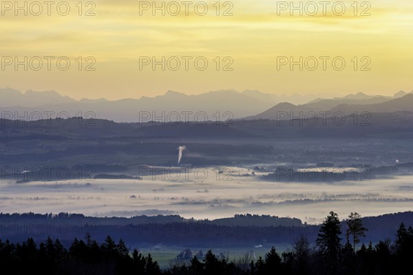 View from Horben of the Reuss Valley covered in fog, behind it the Glarus Alps in the light of the rising sun, Beinwil-Freiamt, Canton, Aargau, Switzerland