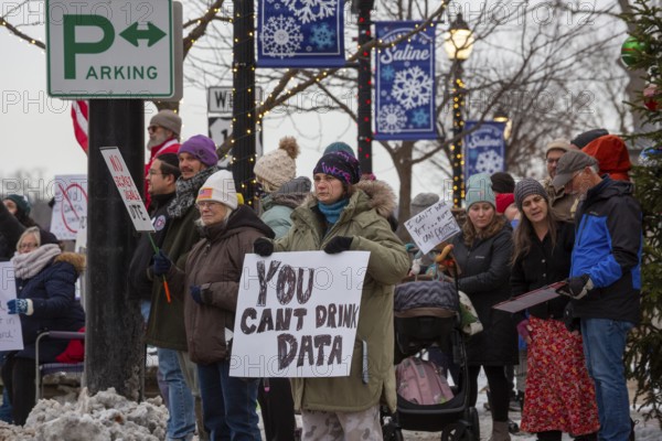 Saline, Michigan USA - 1 December 2025 - Rural Michigan residents rally against the $7 billion Stargate data center planned on southeast Michigan farm land. Protesters say the Data Center is being fast tracked by DTE Energy, the large electric utility, and that it could raise residential electricity rates and endanger the water supply