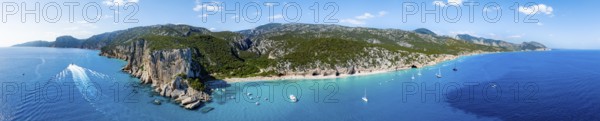 Picturesque rocky coast, cliffs and Cala Luna beach, aerial view, Golfo di Orosei, Baunei, Sardinia, Italy