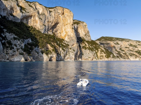 Motorboat rides on picturesque rocky coast ImmorgenLicht, cliffs, Golfo di Orosei, Baunei, Sardinia, Italy