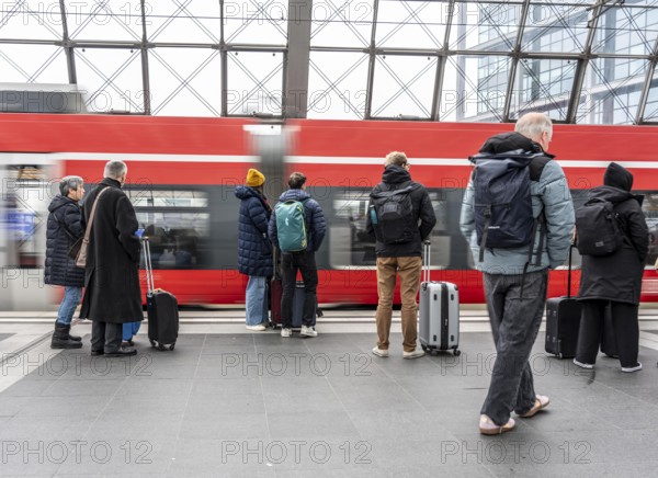 Central Station in Berlin, passengers on the platform, train arrives, Germany