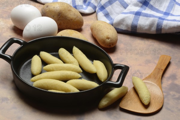 Raw Schupfnudeln in pan, type of pasta, Germany