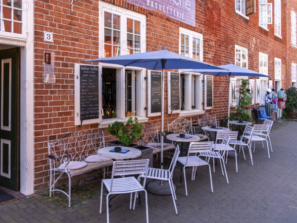 Catering, retail and typical, historic architecture in the Dutch Quarter in Potsdam, Brandenburg, Germany