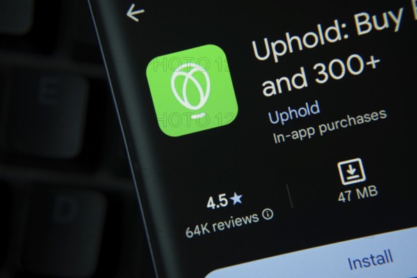 Dhaka, Bangladesh- 19 Sep 2025: a smartphone displays the Uphold app within the Google Play Store