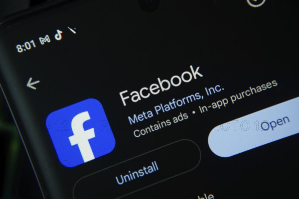 Dhaka, Bangladesh- 27 July 2025: Screen displaying Facebook app with open and uninstall options, dark interface
