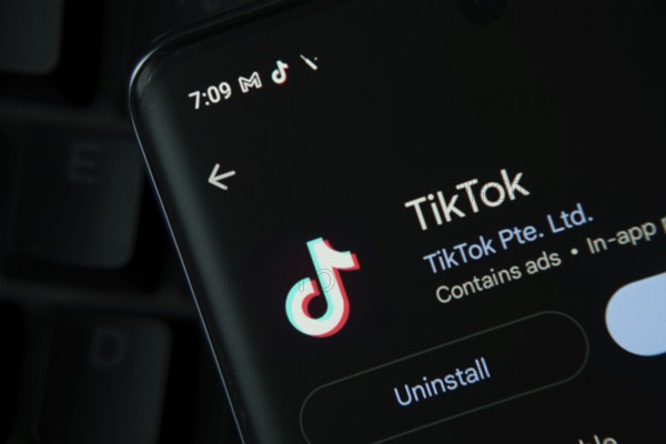 Dhaka, Bangladesh- 27 July 2025: Screen displaying TikTok app with update and uninstall options, dark interface