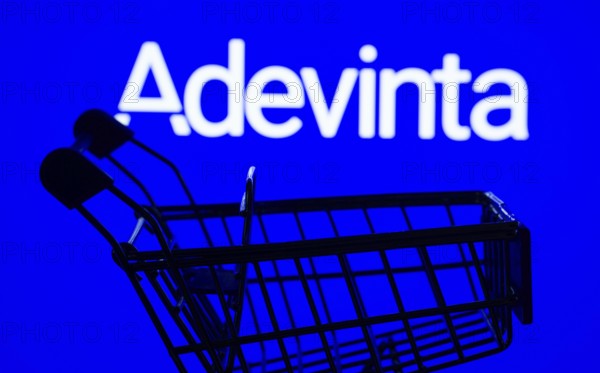 Dhaka, Bangladesh- 03 July 2025: Silhouette of a shopping cart in front of the Adevinta logo, symbolizing ecommerce and online shopping