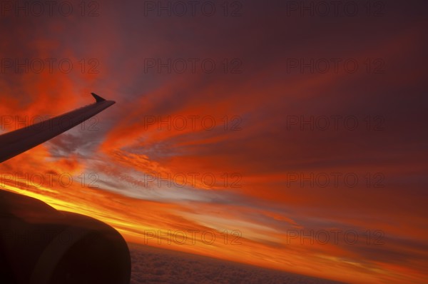View from airplane window at sunrise
