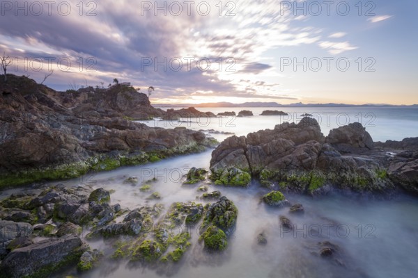 Sunset at Fisherman's Lookout. Dramatic waves and coastal scenery at The Pass, New South Wales, Australia