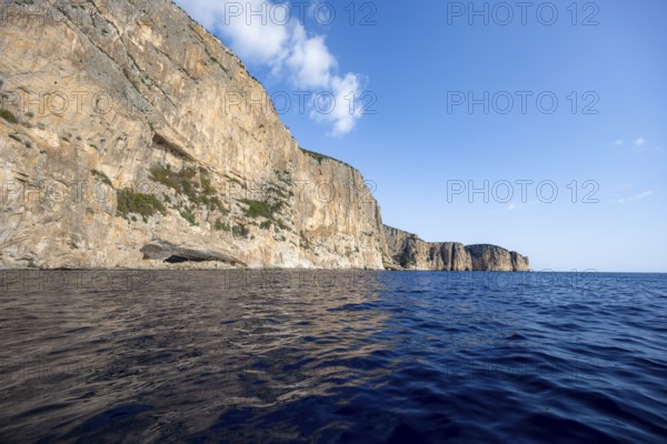 Picturesque rocky coast, cliffs and blue sea, Golfo di Orosei, Baunei, Sardinia, Italy
