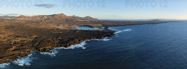 Coast with lava fields, volcanic landscape near Los Hervideros, in the evening light, aerial view, Lanzarote, Canary Islands, Spain