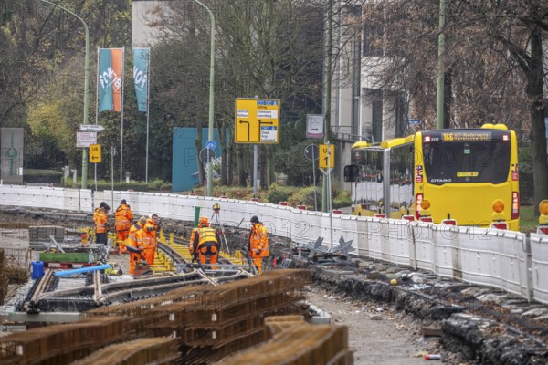 Large-scale construction site in the city center of Essen, Herkulesstraße, the construction of new tracks for the new Stadtbahn-Essen, a new tram line in the city center that will connect the west of the city with the new Essen-51 district, North Rhine-Westphalia, Germany
