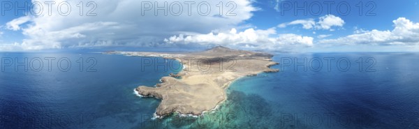 Headland and blue sea, coastal landscape, arid landscape of Los Ajaches Natural Park, aerial view, Lanzarote, Canary Islands, Spain