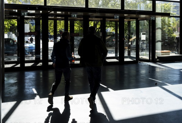 Foyer in a building of the Technical University of Berlin, light and shadow from people at the Marchstraße exit, Berlin, Germany