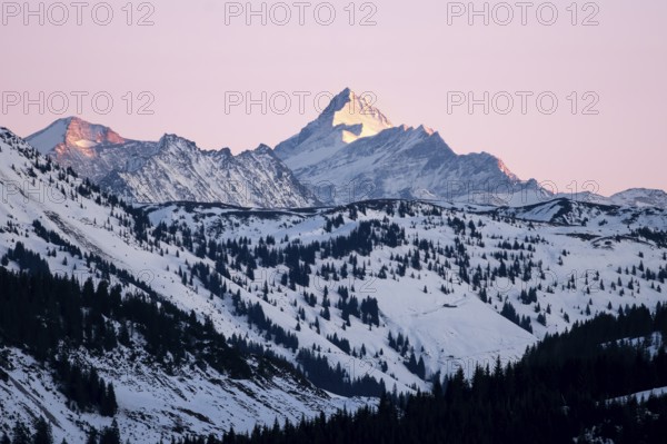 Summit of Grossglockner at sunset in winter, Hochbrixen, Brixen im Thale, Tyrol, Austria