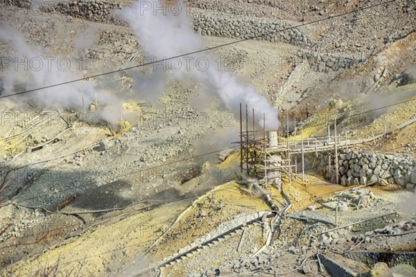 Steaming fumaroles in the Owakudani geothermal area at Komagatake volcano, Hakone, Japan